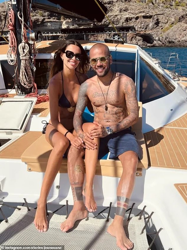 Dani Alves appears to have reconciled with his wife Joana Sanz, 31, (pictured on vacation a few years ago) after being released from prison.