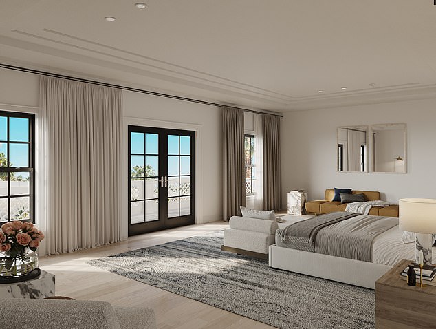 The three-story residence sits on approximately half an acre of land and features stunning oceanfront views and private beach access. In the photo: master bedroom