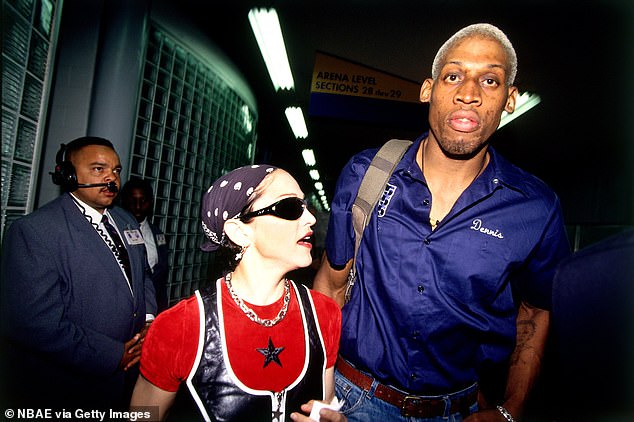 She was also on the verge of a whirlwind romance with Dennis Rodman;  in the photo 1994