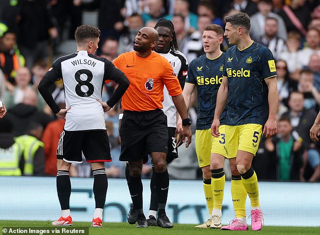 Newcastle and Fulham players invaded the referee while the decision was being made
