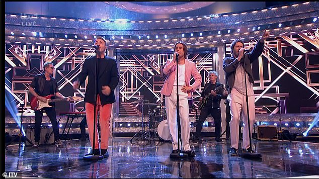 The band, currently consisting of Mark, Howard Donald and Gary Barlow, opened the penultimate episode of the long-running entertainment show with the hit song Shine.