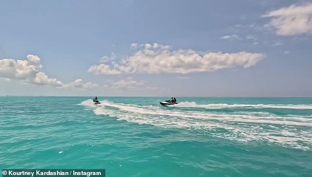 Kourtney uploaded a video to Instagram that same day of her and Kim enjoying a jet ski excursion through the sunny Caribbean Sea.