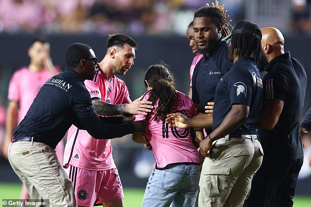 A woman ran onto the pitch to take a selfie with Messi before security quickly intervened.