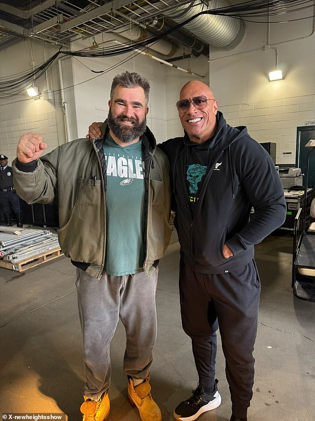 Jason Kelce posted with wrestling legend The Rock after his ring appearance