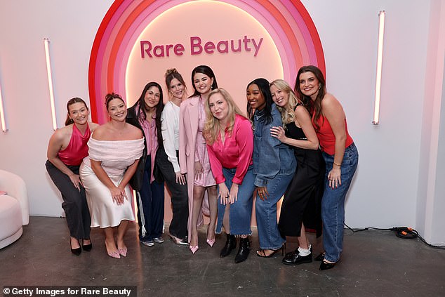 Selena posed with her Rare Beauty public relations team and influencers