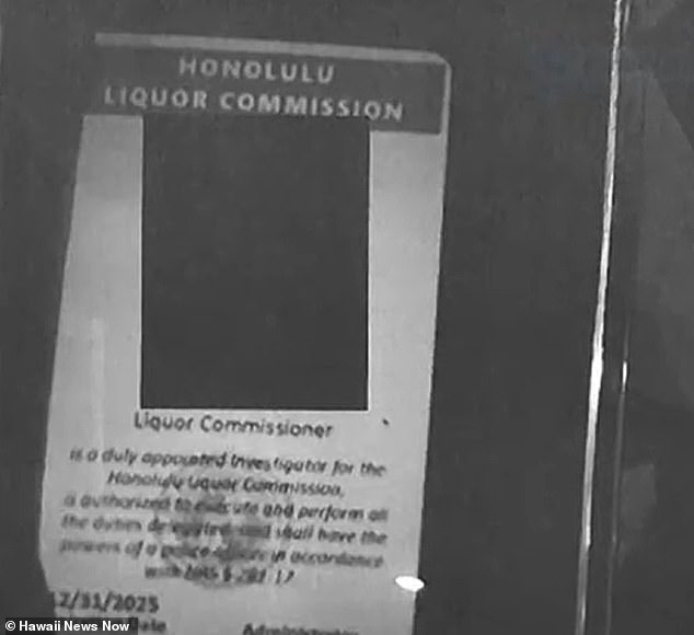 A photo of Martin's liquor commission badge was taken by staff and included in the police report.