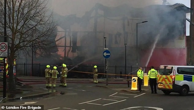 Pictured: The fire in the self-storage warehouse, which was later destroyed due to damage