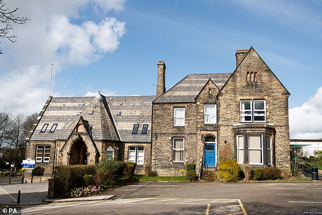 The teacher was immediately forced to flee his housing association home in Batley with his partner and four young children. Pictured: Batley High School