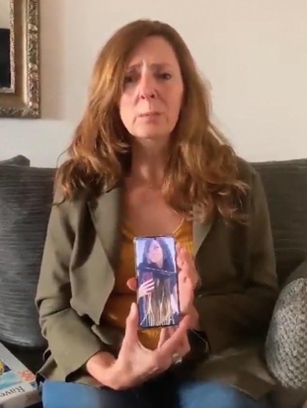 Ricarda Louk, 53, shows a photograph of her daughter before she was brutally murdered in the Hamas attacks on October 7.