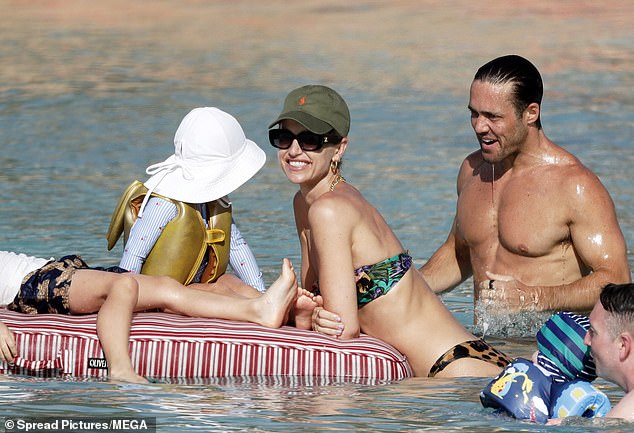 She was joined by her Made In Chelsea star ex-husband Spencer, 35, whose family owns a hotel on the Caribbean island.