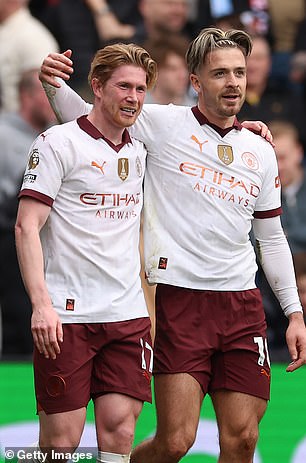 Grealish celebrates with Kevin De Bruyne after the Belgian's goal at Selhurst Park