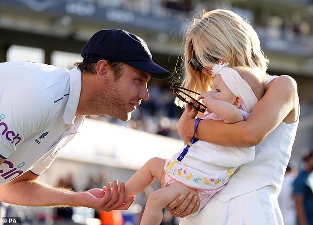 Stuart, Mollie and their young daughter are pictured during his final Ashes in 2023.