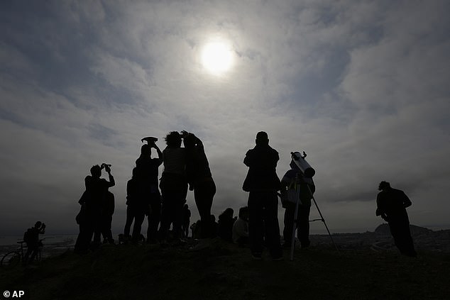 Spectators watching the last solar eclipse in August 2017 from Bernal Heights Hill in San Francisco