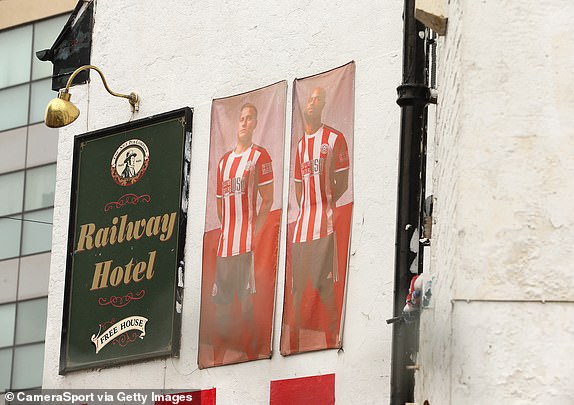 SHEFFIELD, ENGLAND - APRIL 7: A view of portraits of Sheffield United players displayed in the Railway Inn pub on Bramall Lane, home of Sheffield United, before the Premier League match between Sheffield United and Chelsea FC at Bramall Lane on April 7, 2024 in Sheffield, England. (Photo by Rich Linley – CameraSport via Getty Images)