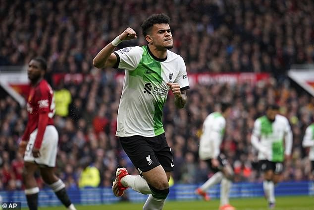 Díaz celebrates after taking advantage of weak defending to put Liverpool ahead.