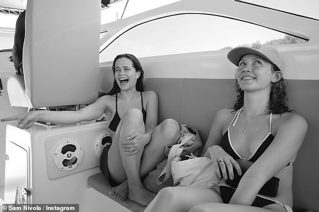 Sarah Catherine Hook, 28, joined the stars in a shaded area of ​​the cruise ship's cabin.  The American Crime Story alum appeared to be laughing out loud as she lounged around in a bikini and a pair of swim shorts.