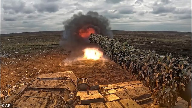 In this photo taken from a video and published by the press service of the Russian Ministry of Defense on Thursday, April 4, 2024, a Russian tank fires at an undisclosed location in Ukraine.