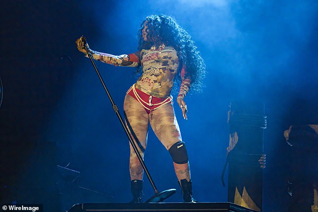 The singer changed her boots and added a knee pad for her headlining performance.