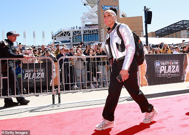 Staley also wore Louis Vuitton shoes on the red carpet before this weekend's title game in Ohio.