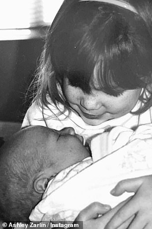 Ashley shared photos with her brother when she was a newborn