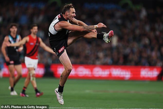 Finlayson (pictured) used the insult during Port's victory over Essendon on Friday night.  He apologized to the victim after the match and now faces punishment from the AFL.