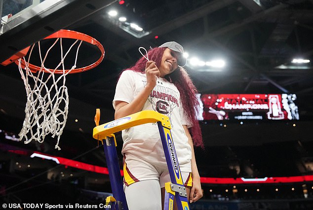 South Carolina's Kamilla Cardoso helped cut down the nets after the Gamecocks' win