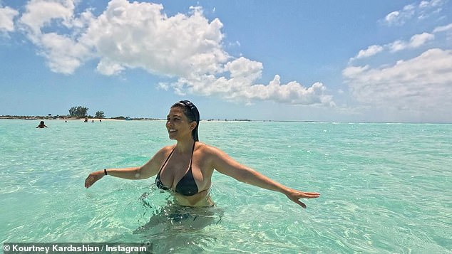 The 44-year-old reality star took to Instagram on Sunday and wowed in a busty string bikini.