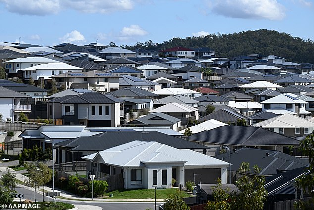 The warning came after ME Bank cut its fixed rates by 60 basis points on Friday, taking its lowest owner-occupier rate to just 5.79 per cent (pictured houses in Ipswich, southwest of Brisbane).