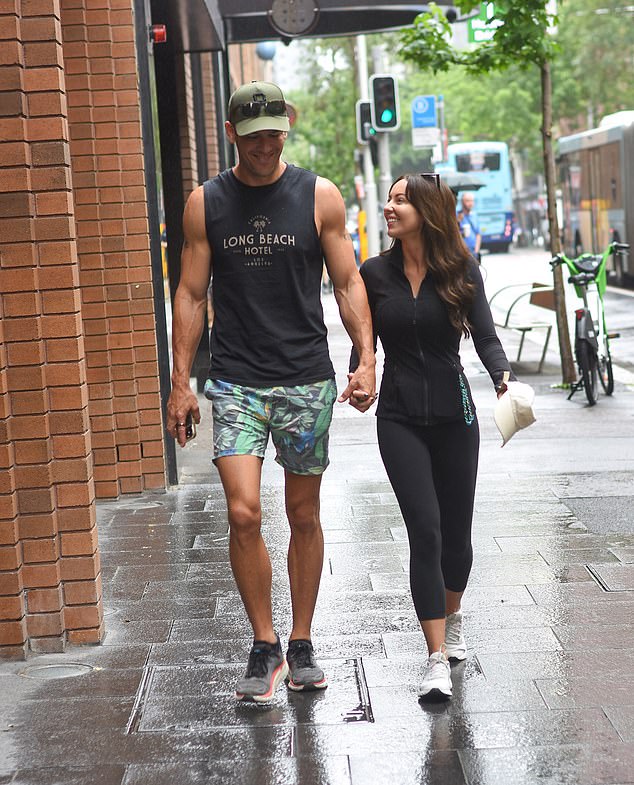 Ellie, 32, and Jono, 38, looked calm and collected as they were photographed enjoying a low-key breakfast at Cali Press in Sydney's CBD.