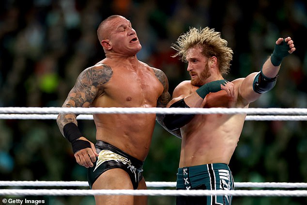 Paul fought in a threat match against Randy Orton (pictured left) and Kevin Owens.