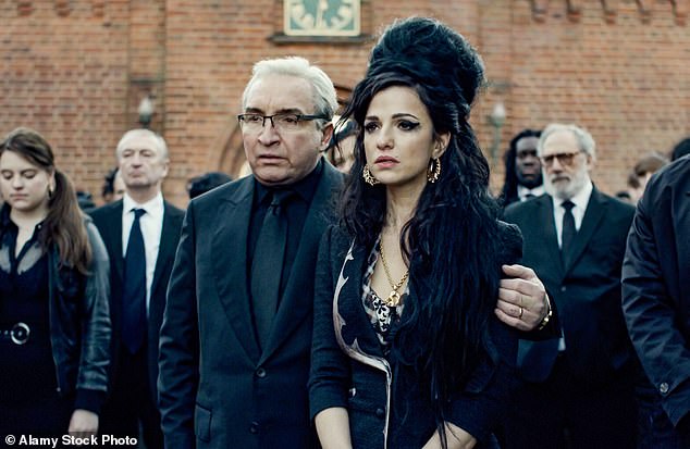 Friends vented their fury at her father after he allowed macabre scenes of Amy's drug overdose to be filmed in her old flat (Marisa pictured with Eddie Marsan as Mitch Winehouse)