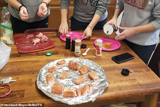 The students then learned how to butcher, pluck, and remove the organs and legs from the chickens before marinating them and placing them in the oven.