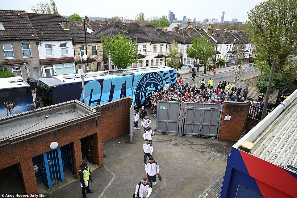 A small crowd gathered around the City bus after it arrived at the ground, and the players streamed through the gates.