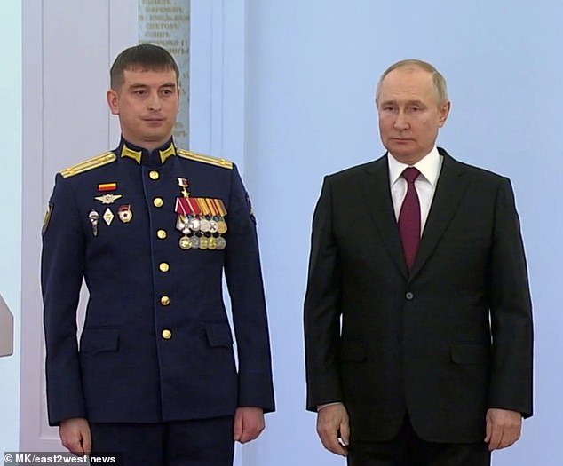 Ukrainian investigative outlet evocation.info has named Lieutenant Colonel Sergei Ishtuganov (pictured left with Putin), 37, a Hero of Russia for giving the order for the alleged war crime.