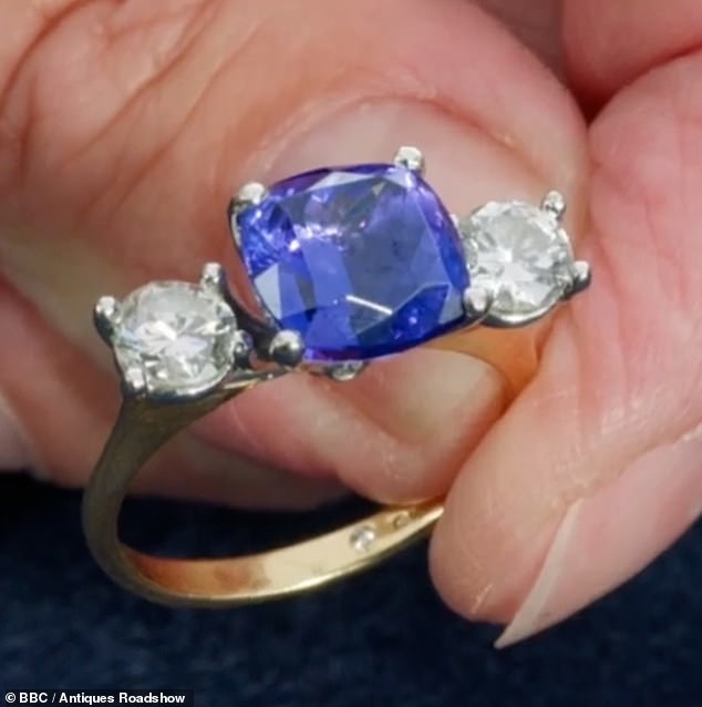 Standing on the lawn of Alexandria Gardens in Cardiff, antiques expert Joanna Hardy revealed that the ring contained a rare and scarce blue stone called tanzanite (pictured).