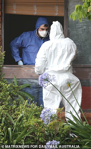 Forensic police at the crime scene in Cranebrook, western Sydney, after Dannielle's body was found.