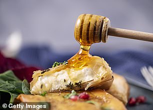 Baked feta in filo with a drizzle of honey (archive image)