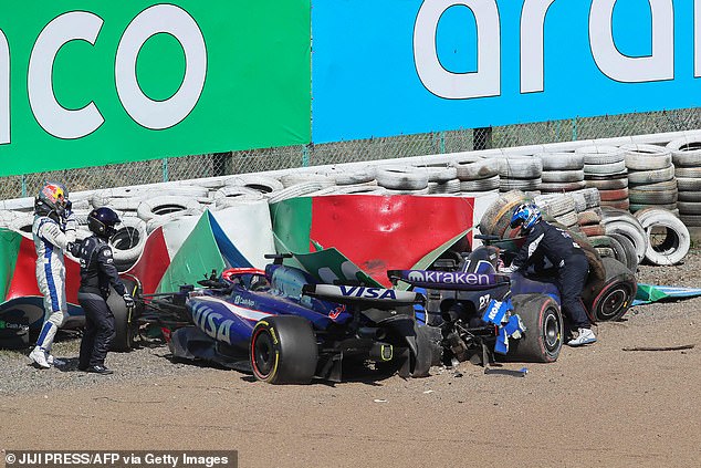 Williams' Alex Albon (right) crashed at Suzuka after contact with Daniel Ricciardo (left)