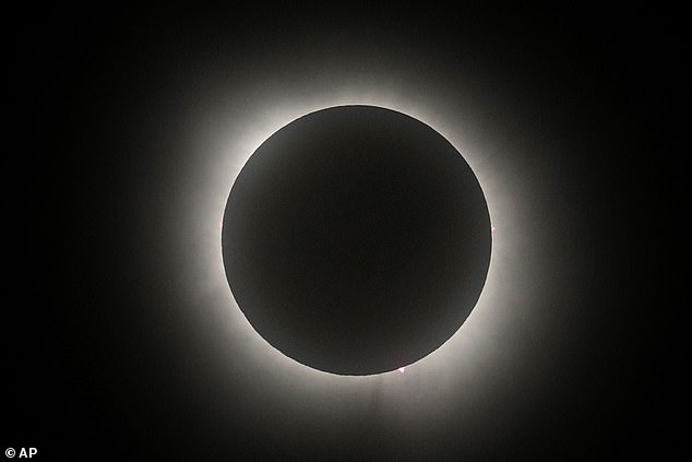 The moon partially covers the sun during a total solar eclipse, seen from Eagle Pass, Texas, on Monday, April 8.