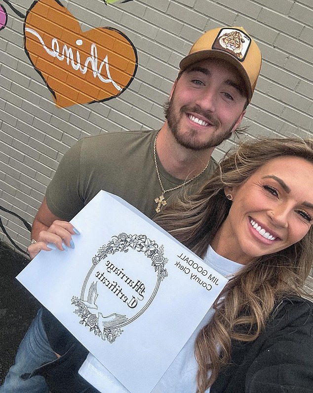 The couple announced the news on their social media with Smith, 29, holding up a marriage certificate from the Wilson County Clerk's Office in Tennessee as the two smiled at the camera.
