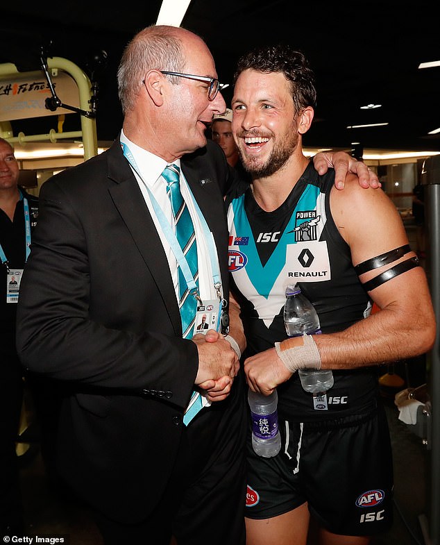 Port president David Koch (pictured with Power star Travis Boak after a game) was also criticized by fans who thought he downplayed the severity of Finlayson's outburst.