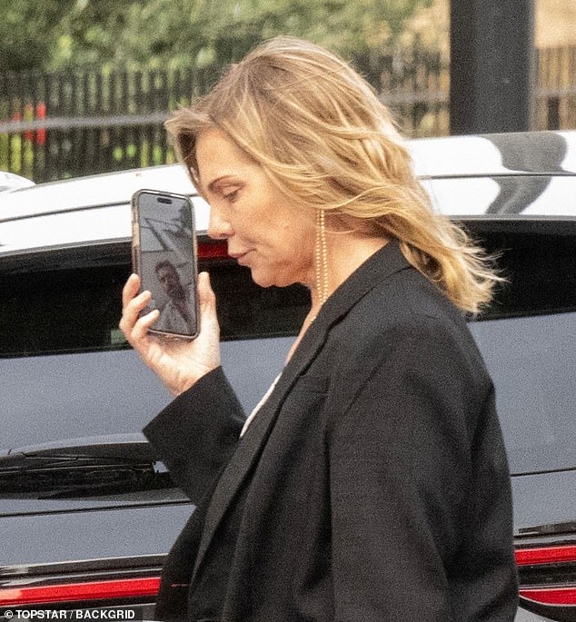 She was seen having a video call with her boyfriend, actor Oliver Farnworth, 41, while walking.
