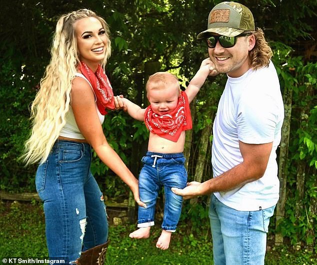 Smith and Wallen are pictured with their three-year-old son Indigo.