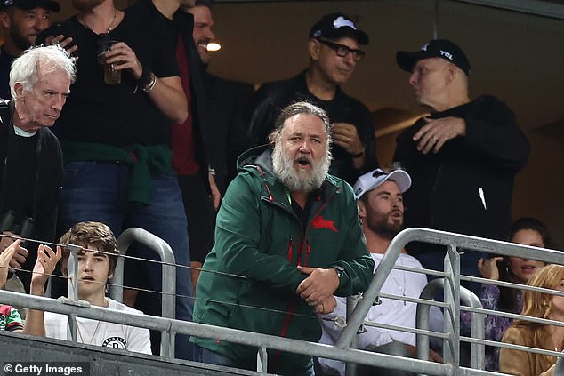 Luke and Tom Burgess were reportedly involved in a confrontation with officials in the private box of Souths co-owner Russell Crowe (pictured, centre, with Hollywood stars Chris Hemsworth and Jeff Goldblum at a game of the NRL in 2021).