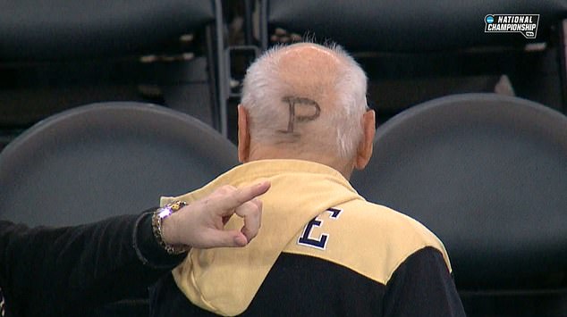 The 87-year-old removed his cap to reveal the letter 'P' shaved into the back of his hair.