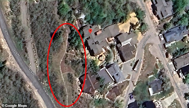 Prince claims the rock wall (circled) crosses the property line between the lot he purchased a few weeks ago and the lot next door. The Hermanns say he purposely bought the lot a few weeks ago out of spite.