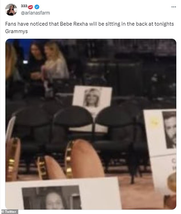 On Twitter, one eagle-eyed fan shared an image of what appeared to be her place card on a folding chair behind the stars, along with a caption that read: 