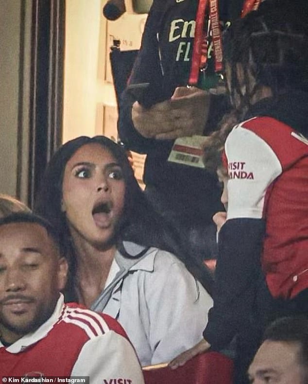 Kim Kardashian looks excited while watching Arsenal take on Sporting Lisbon