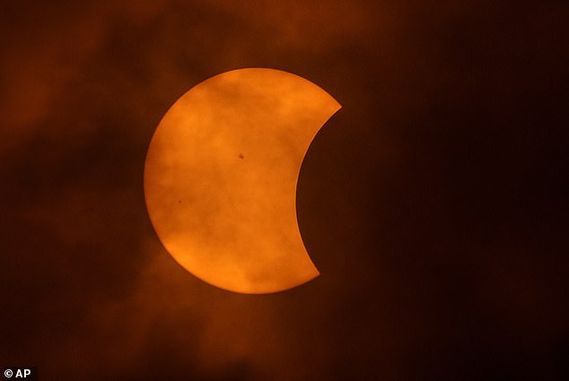 The moon partially covers the sun during a total solar eclipse, as seen from Eagle Pass, Texas, on Monday, April 8, 2024.