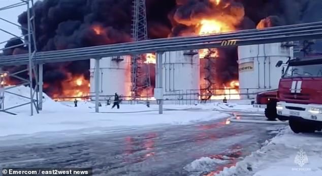 A devastating fire is seen following a Ukrainian kamikaze drone attack on an oil depot in Klintsy, Russia's Bryansk region.
